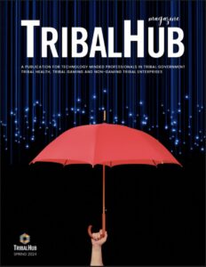 TribalNet magazine cover with red umbrella on it