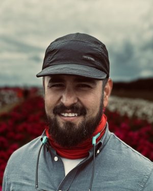 Bobby Castillo wearing a hat